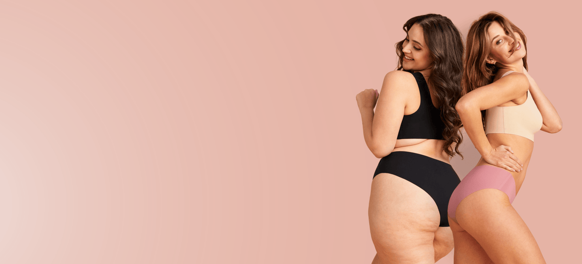 Zwei Models tragen nahtlose ooia Periodenunterwäsche in Rosa und Schwarz